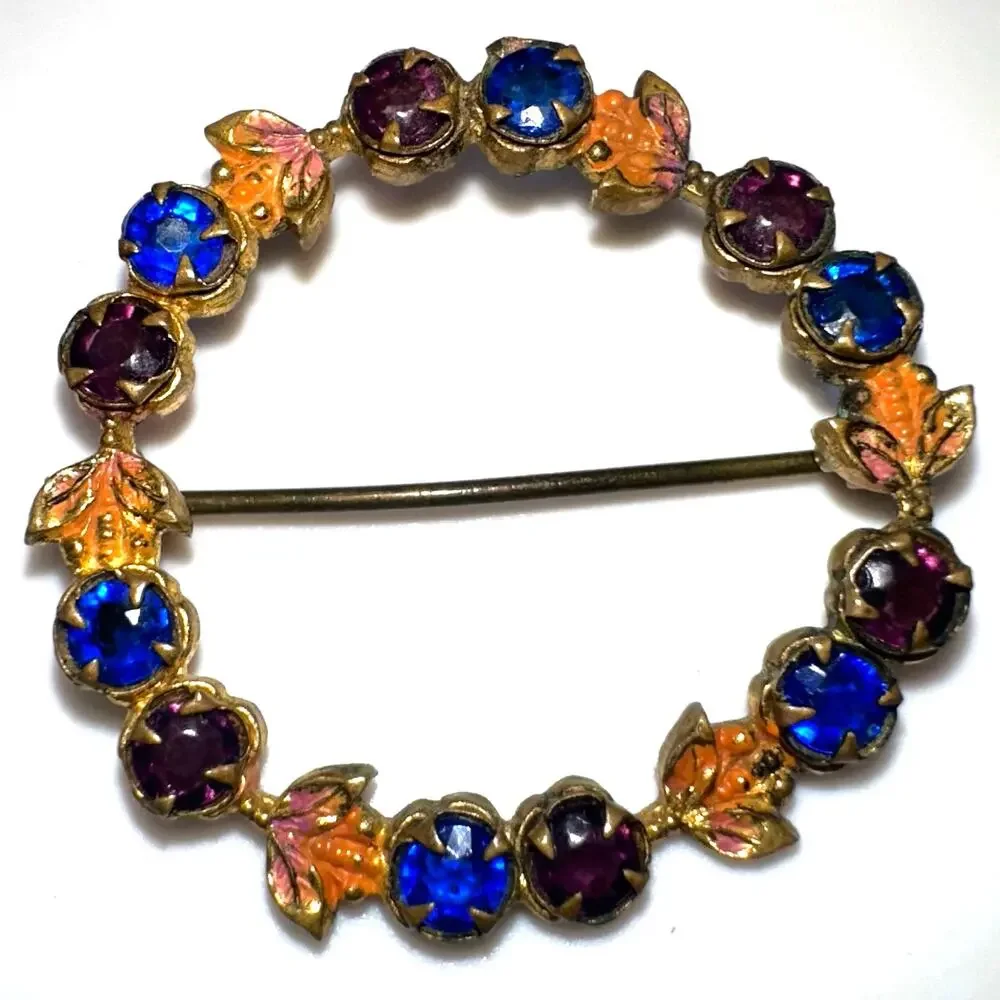 Antique gold tone blue purple Czech glass rhinestones enamel wreath brooch